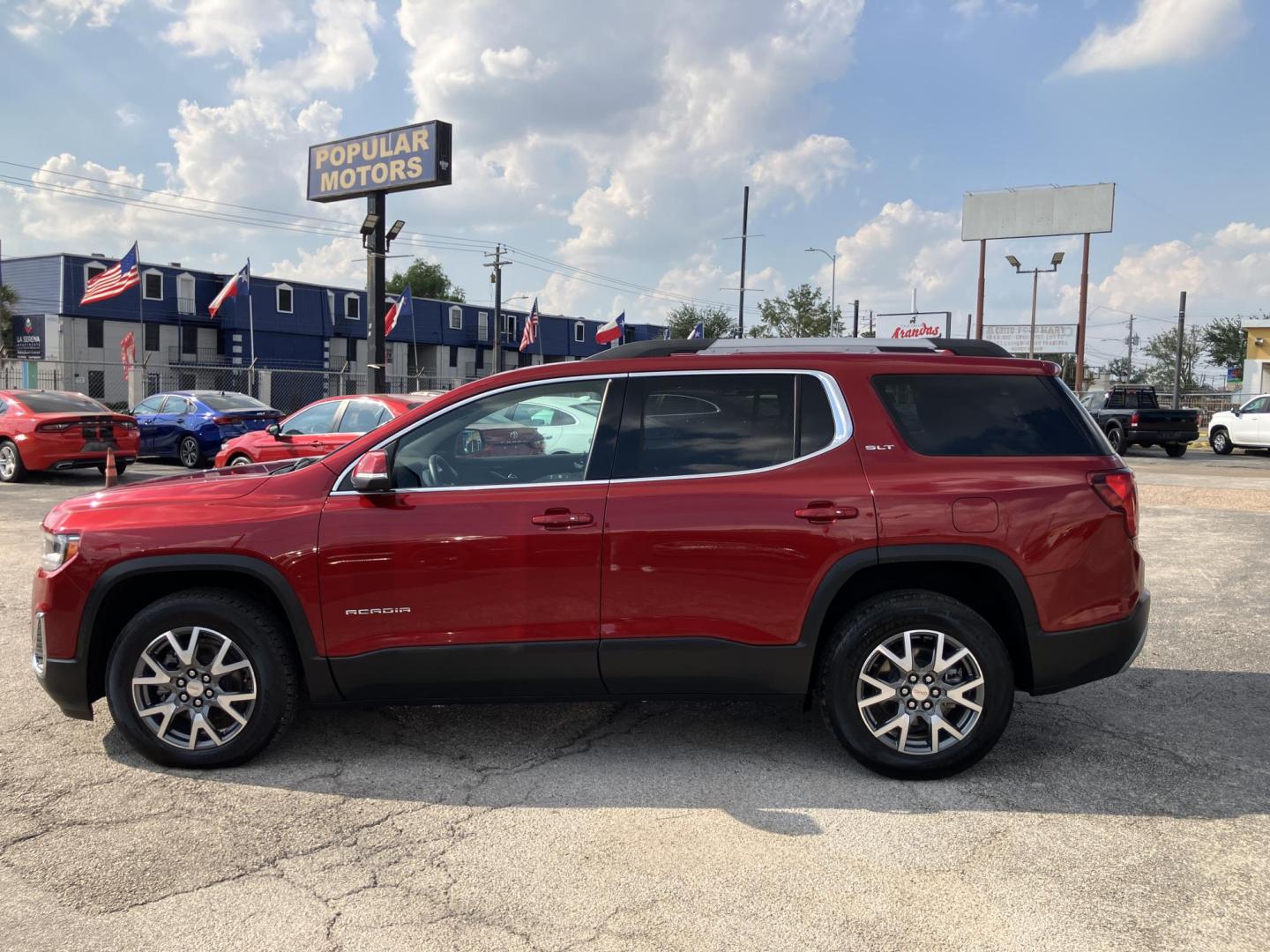 2023 Red /Gray GMC Acadia SLT AWD (1GKKNUL47PZ) with an 2.0L L4 DOHC 16V TURBO engine, 9A transmission, located at 1842 Wirt Road, Houston, TX, 77055, (713) 973-3903, 29.805330, -95.484787 - Photo#1