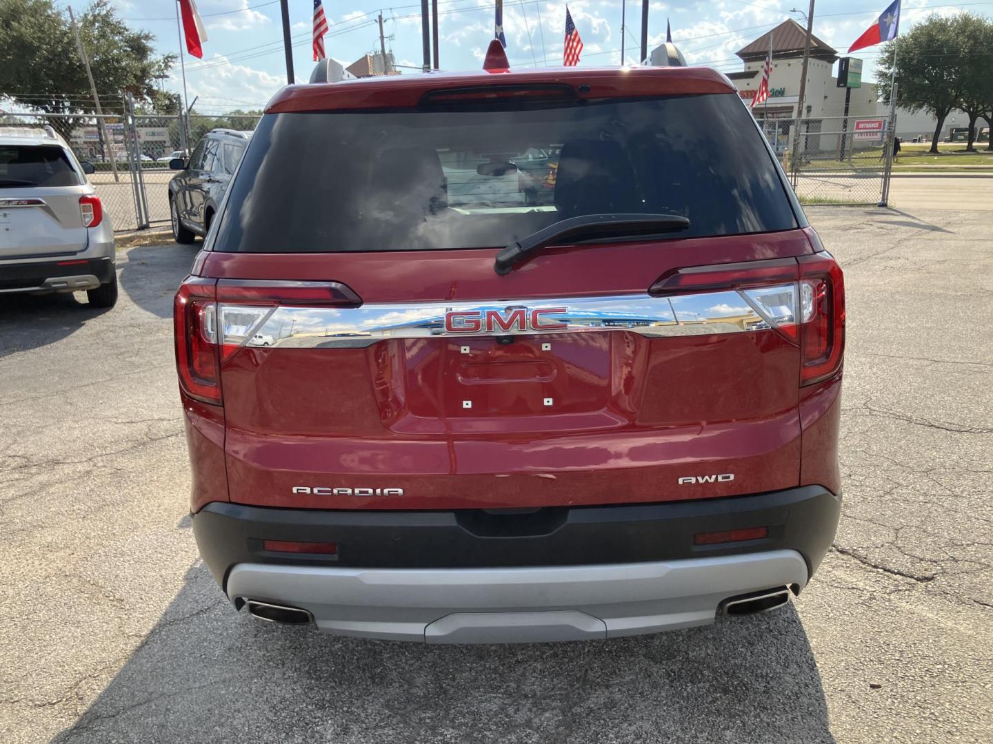 2023 Red /Gray GMC Acadia SLT AWD (1GKKNUL47PZ) with an 2.0L L4 DOHC 16V TURBO engine, 9A transmission, located at 1842 Wirt Road, Houston, TX, 77055, (713) 973-3903, 29.805330, -95.484787 - Photo#3