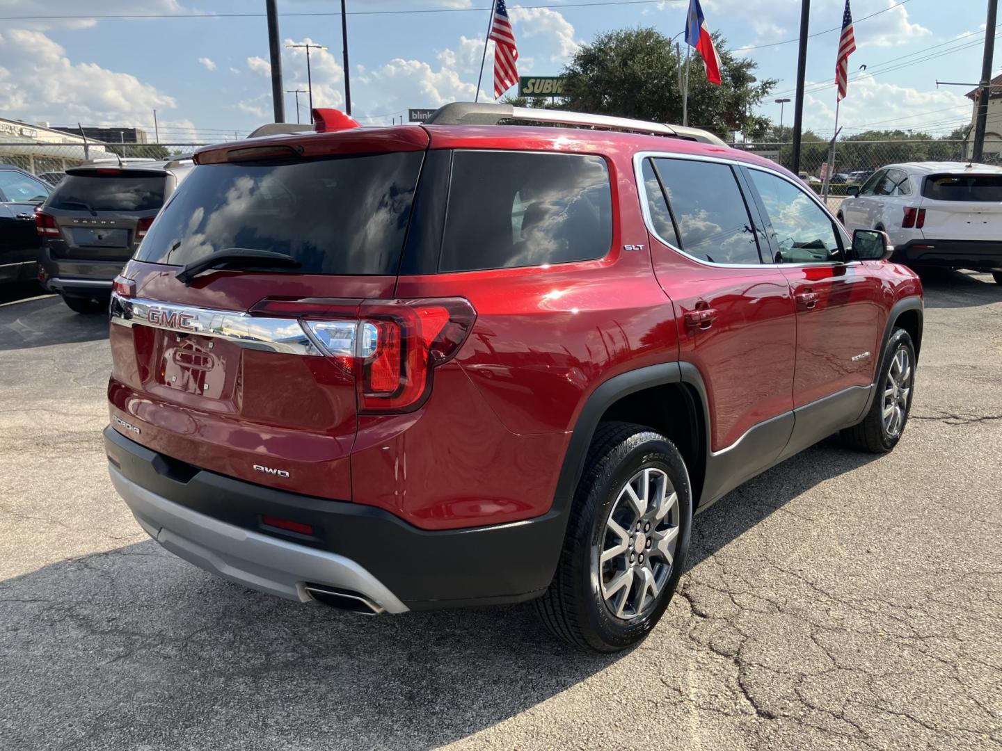 2023 Red /Gray GMC Acadia SLT AWD (1GKKNUL47PZ) with an 2.0L L4 DOHC 16V TURBO engine, 9A transmission, located at 1842 Wirt Road, Houston, TX, 77055, (713) 973-3903, 29.805330, -95.484787 - Photo#4