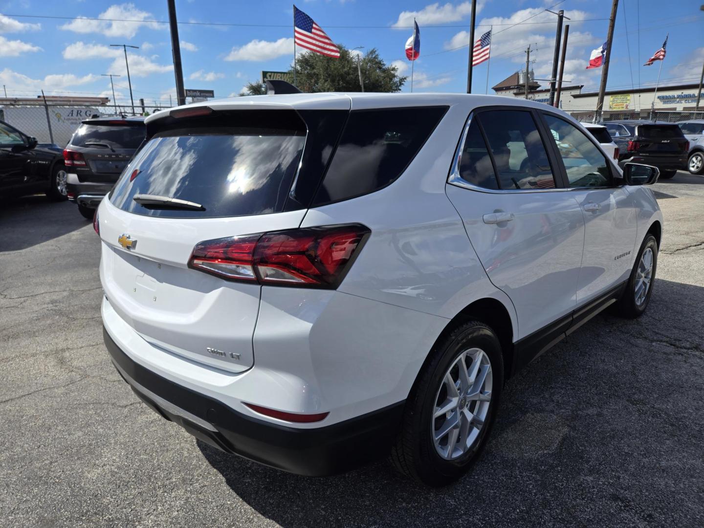 2023 White Chevrolet Equinox LT AWD (3GNAXUEG7PL) with an 1.5L L4 DOHC 16V TURBO engine, 6A transmission, located at 1842 Wirt Road, Houston, TX, 77055, (713) 973-3903, 29.805330, -95.484787 - Photo#4