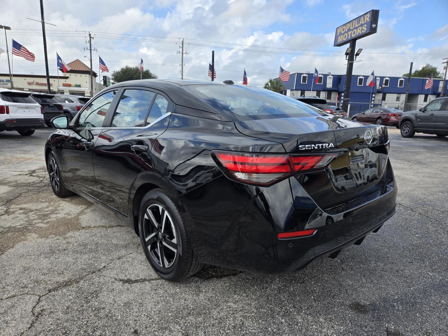 2024 Black Nissan Sentra SV (3N1AB8CV4RY) with an 1.8L L4 SFI DOHC 16V engine, CVT transmission, located at 1842 Wirt Road, Houston, TX, 77055, (713) 973-3903, 29.805330, -95.484787 - Photo#2