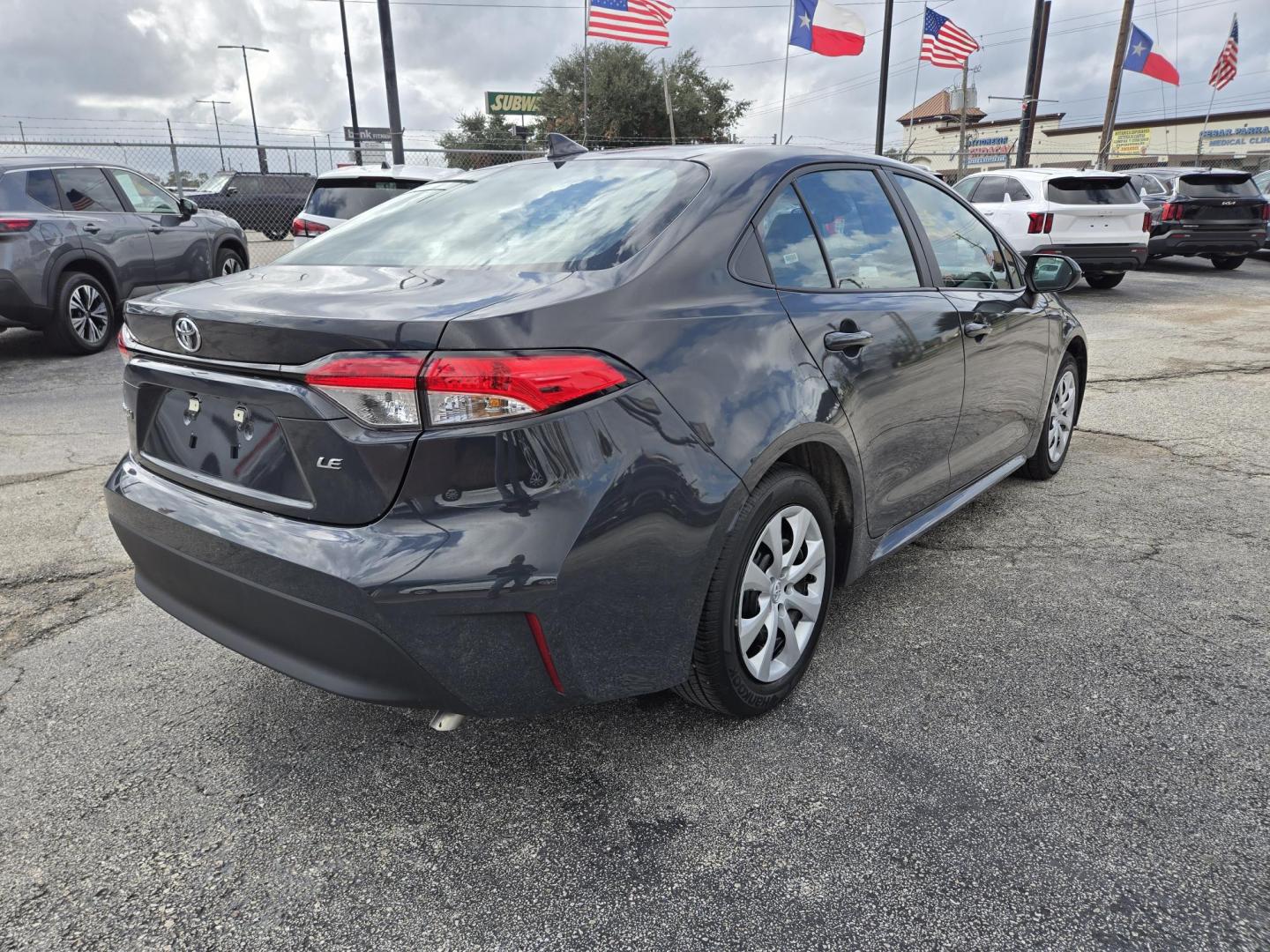 2024 Black Toyota Corolla LE (5YFB4MDE3RP) with an 2.0L L4 DOHC 16V engine, CVT transmission, located at 1842 Wirt Road, Houston, TX, 77055, (713) 973-3903, 29.805330, -95.484787 - Photo#4