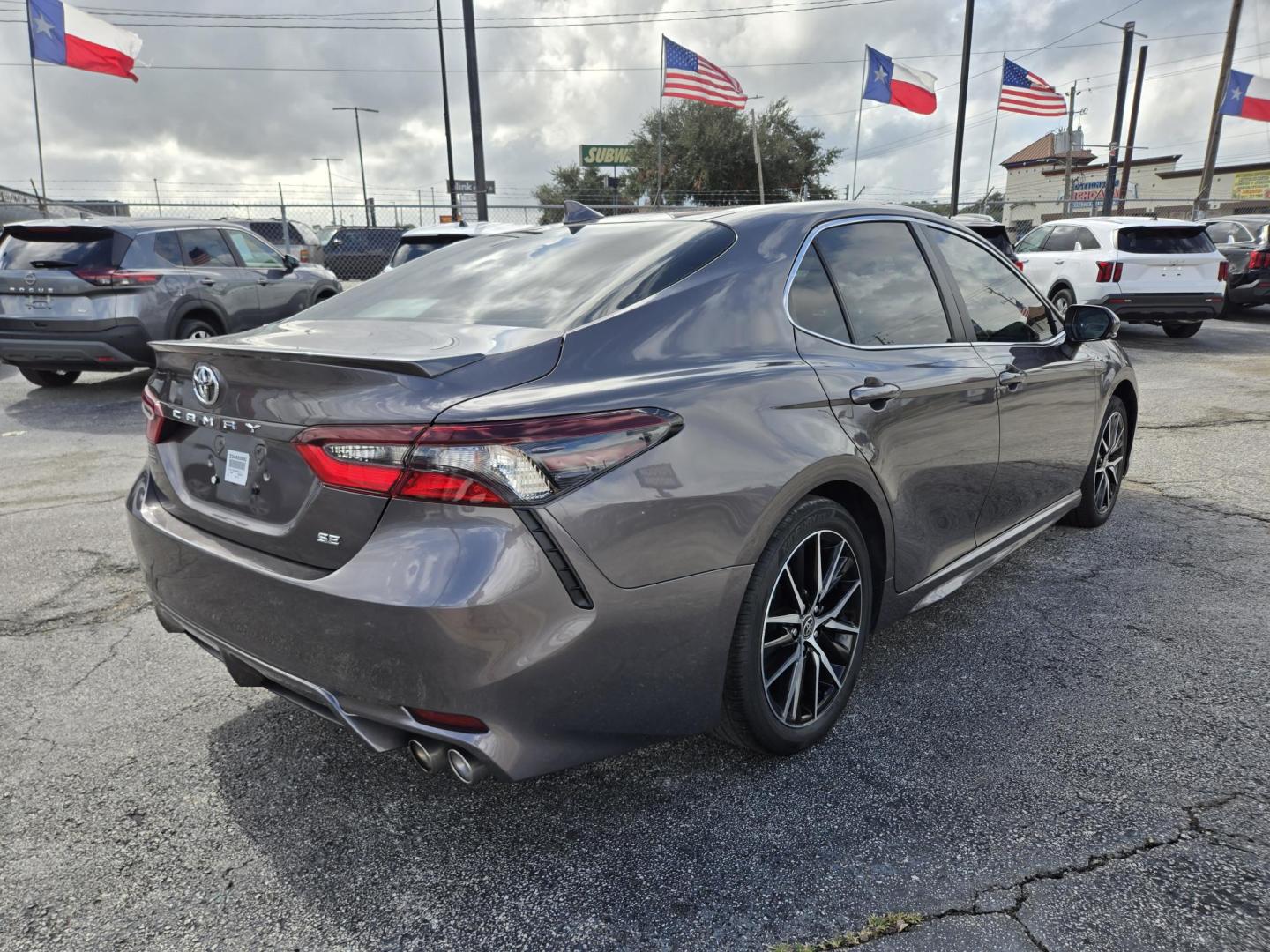 2023 Gray Toyota Camry SE (4T1G11AK9PU) with an 2.5L L4 DOHC 16V engine, 8A transmission, located at 1842 Wirt Road, Houston, TX, 77055, (713) 973-3903, 29.805330, -95.484787 - Photo#2