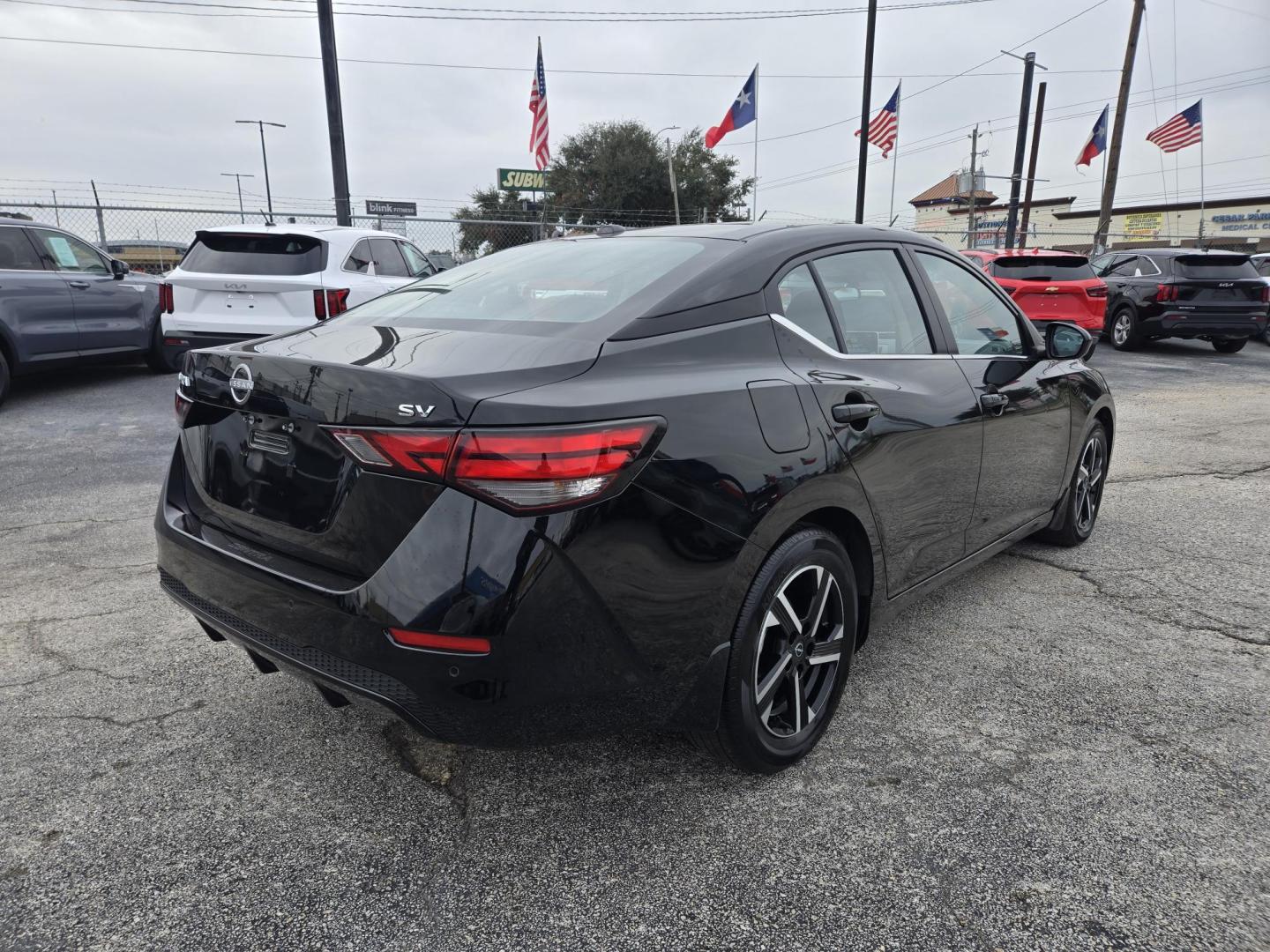 2024 Black /Black Nissan Sentra SV (3N1AB8CV1RY) with an 1.8L L4 SFI DOHC 16V engine, CVT transmission, located at 1842 Wirt Road, Houston, TX, 77055, (713) 973-3903, 29.805330, -95.484787 - Photo#4